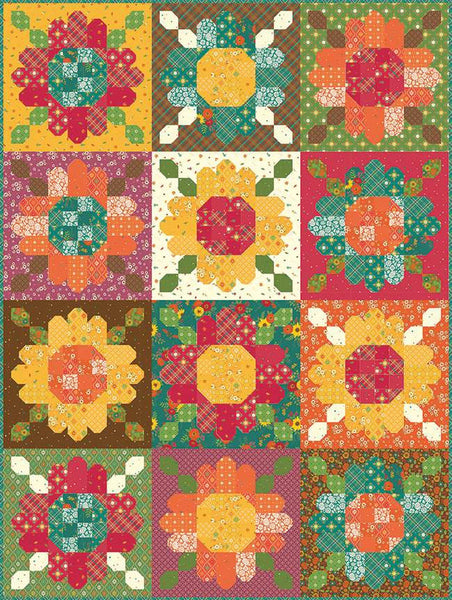 Image of the Zinnia Seeds Sampler Quilt Pattern by Heather Peterson for Riley Blake Designs. Features  pieced flowers in green, red, yellow, orange, and brown.
Cute Little Fabric Shop