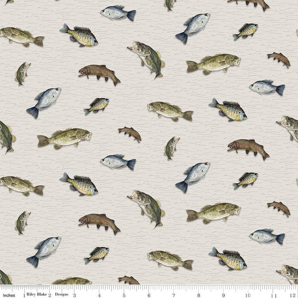 Tan colored quilting cotton fabric. Riley Blake Designs Wake at the Lake featuring scattered fish on a tan, cream background. 
Cute Little Fabric Shop