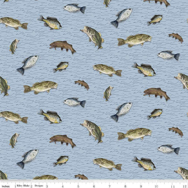 Sky blue colored quilting cotton fabric. Riley Blake Designs Wake at the Lake featuring scattered fish on a light blue background. 
Cute Little Fabric Shop