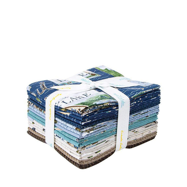 Fat quarter bundle from the Wake at the Lake collection by Riley Blake Designs. Pictures a 16 piece fat quarter bundle with mainly blue, cream, and brown fabrics. 
Cute Little Fabric Shop