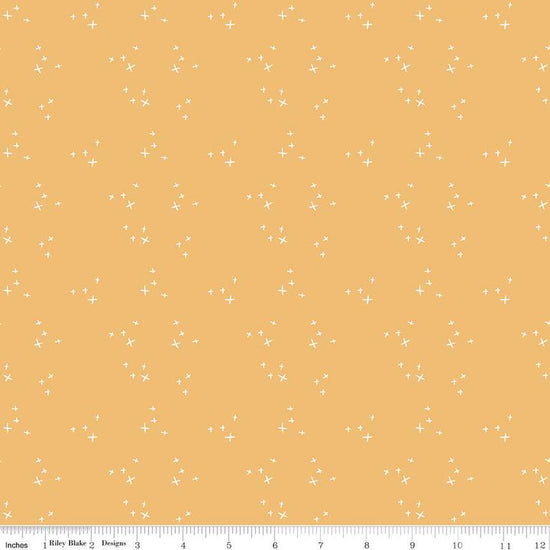 Image of gold, yellow colored Riley Blake quilting cotton fabric from the Pumpkin Spice collection. Scattered sparkles on a yellow background. 
Cute Little Fabric Shop