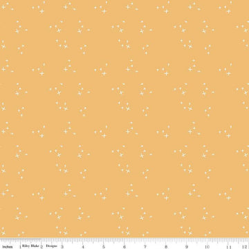 Image of gold, yellow colored Riley Blake quilting cotton fabric from the Pumpkin Spice collection. Scattered sparkles on a yellow background. 
Cute Little Fabric Shop
