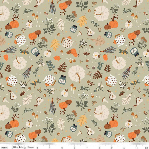 Image of light sage green colored quilting cotton fabric for the Pumpkin Spice collection by Riley Blake Designs. Features scattered pumpkins, flowers, and apples, mushrooms, leaves, and candles on the light green background. 
Cute Little Fabric Shop