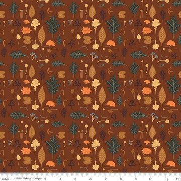 Image of brown colored quilting cotton fabric for the Pumpkin Spice collection by Riley Blake Designs. Features scattered various leaves on a brown background. 
Cute Little Fabric Shop