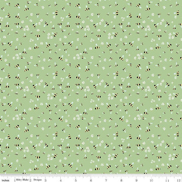 Clover Farm from Riley Blake Designs. Image depicts small bees and flowers scattered on a green background. Quilting cotton fabric. 
Cute Little Fabric Shop