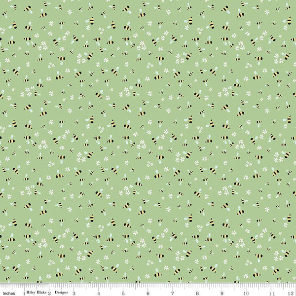 Clover Farm from Riley Blake Designs. Image depicts small bees and flowers scattered on a green background. Quilting cotton fabric. 
Cute Little Fabric Shop