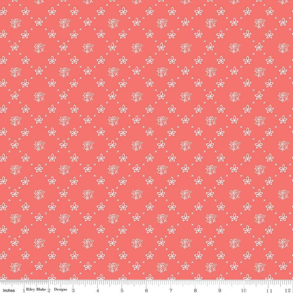 Clover Farm from Riley Blake Designs. Image depicts scattered flowers and Xs on a coral pink background. Quilting cotton fabric. 
Cute Little Fabric Shop
