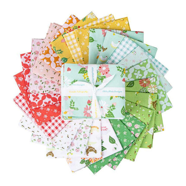 Image of a fat quarter bundle from the Clover Farm by Riley Blake Designs. The main aqua fabric with flowers and strawberries is depicted with yellow, blue, green, and red fabrics around it.
Cute Little Fabric Shop