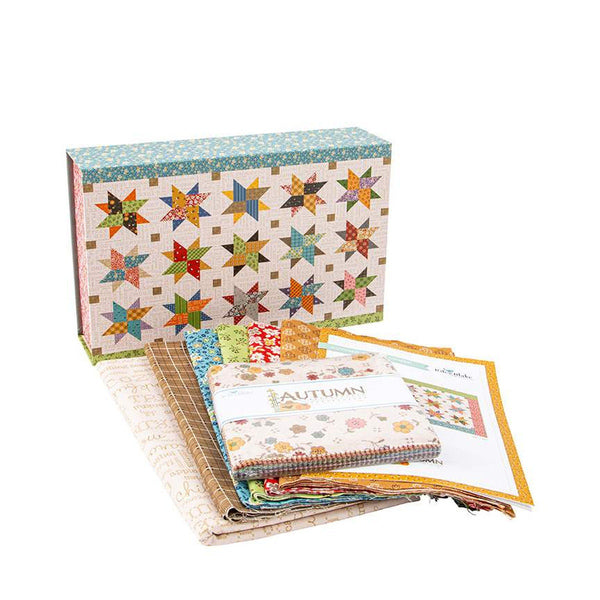 Image of the Lori Holt Autumn Skies Runner Quilt Kit. Image depicts a star pattern runner with blue, green, red, and yellow.
Cute Little Fabric Shop