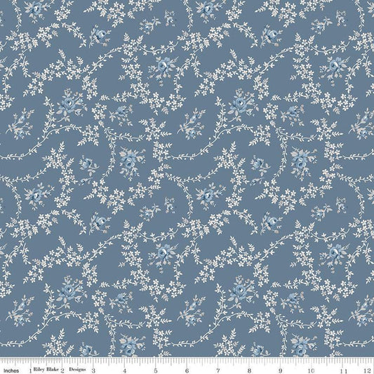 Image of the Serenity Blues Vines Blue quilting cotton fabric by Gerri Robinson for Riley Blake Designs. Features tossed blossoms and vines of leaves on a light blue background. 
Cute Little Fabric Shop