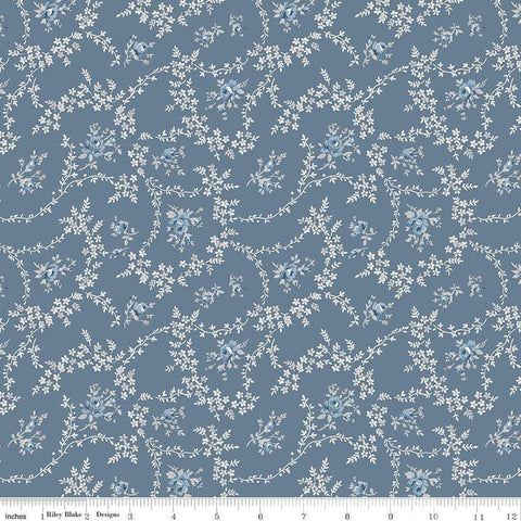 Image of the Serenity Blues Vines Blue quilting cotton fabric by Gerri Robinson for Riley Blake Designs. Features tossed blossoms and vines of leaves on a light blue background. 
Cute Little Fabric Shop