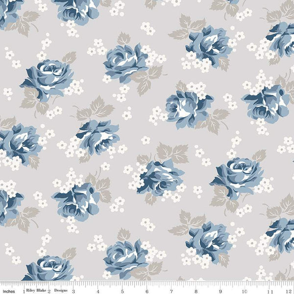 Image of the Serenity Blues Roses Taupe quilting cotton fabric by Gerri Robinson for Riley Blake Designs. Features scattered roses and small blossoms on a light gray background. 
Cute Little Fabric Shop