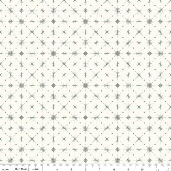 Image of Christmas Is in Town Stars Cream by Riley Blake Designs. Features arranged sparkle stars on a cream white background. 
Cute Little Fabric Shop