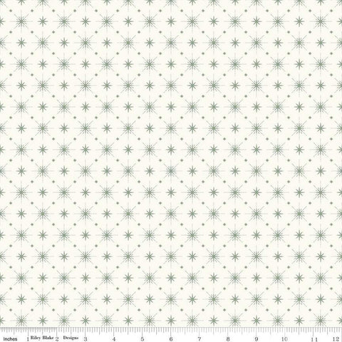 Image of Christmas Is in Town Stars Cream by Riley Blake Designs. Features arranged sparkle stars on a cream white background. 
Cute Little Fabric Shop