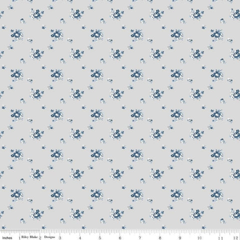 Image of the Serenity Blues Delicate Roses Taupe quilting cotton fabric by Gerri Robinson for Riley Blake Designs. Features scattered roses and small blossoms on a light gray background. 
Cute Little Fabric Shop