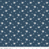 Image of the Serenity Blues Delicate Roses Navy quilting cotton fabric by Gerri Robinson for Riley Blake Designs. Features scattered flowers and small blossoms on a dark blue background. 
Cute Little Fabric Shop