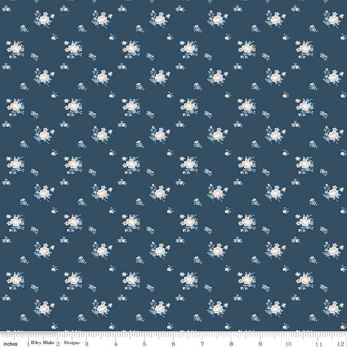 Image of the Serenity Blues Delicate Roses Navy quilting cotton fabric by Gerri Robinson for Riley Blake Designs. Features scattered flowers and small blossoms on a dark blue background. 
Cute Little Fabric Shop