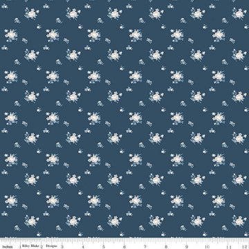 Image of the Serenity Blues Delicate Roses Navy quilting cotton fabric by Gerri Robinson for Riley Blake Designs. Features scattered flowers and small blossoms on a dark blue background. 
Cute Little Fabric Shop
