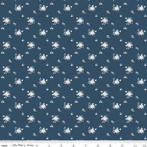 Image of the Serenity Blues Delicate Roses Navy quilting cotton fabric by Gerri Robinson for Riley Blake Designs. Features scattered flowers and small blossoms on a dark blue background. 
Cute Little Fabric Shop