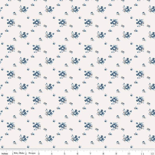 Image of the Serenity Blues Delicate Roses Cream quilting cotton fabric by Gerri Robinson for Riley Blake Designs. Features scattered flowers and small blossoms on a cream white background. 
Cute Little Fabric Shop