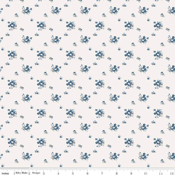 Image of the Serenity Blues Delicate Roses Cream quilting cotton fabric by Gerri Robinson for Riley Blake Designs. Features scattered flowers and small blossoms on a cream white background. 
Cute Little Fabric Shop