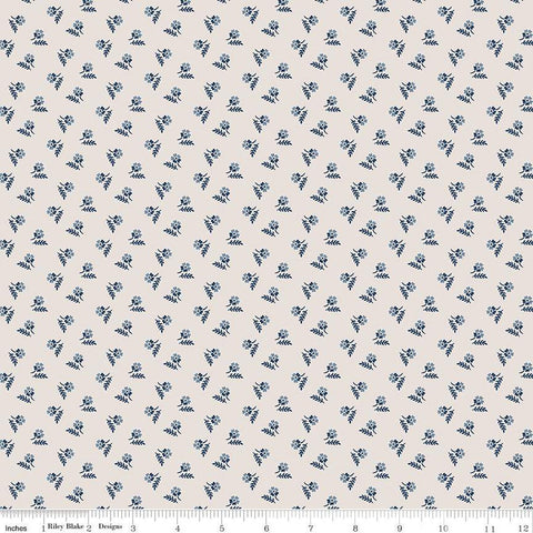 Image of the Serenity Blues Tiny Floral Beige quilting cotton fabric by Gerri Robinson for Riley Blake Designs. Features scattered blossoms and sprigs of leaves on a light tan beige background. 
Cute Little Fabric Shop