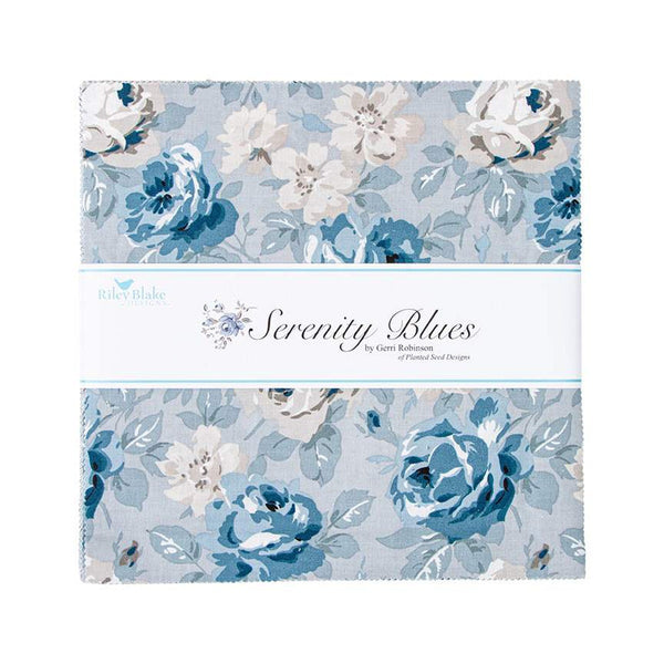 Image of the Serenity Blues 10 inch stacker by Gerri Robinson for Riley Blake Designs. Pictures the main grey fabric with large blue and white roses on a grey background. 
Cute Little Fabric Shop