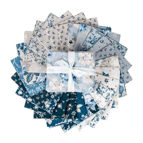 Image of the Serenity Blues Fat Quarter Bundle by Gerri Robinson for Riley Blake Designs. Pictures the main grey fabric with large blue and white roses on a grey background. 
Cute Little Fabric Shop