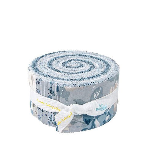 Image of the Serenity Blues Rolie Polie by Gerri Robinson for Riley Blake Designs. Pictures the main grey fabric with large blue and white roses on a grey background. 
Cute Little Fabric Shop