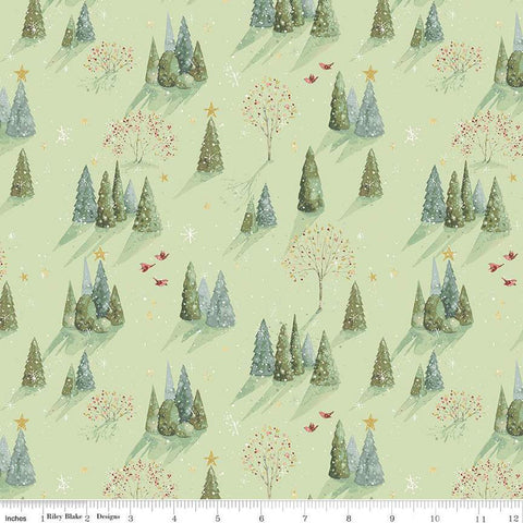 Image of the Magical Winterland Trees Green quilting cotton fabric by Riley Blake Designs. Features scattered trees on a green background. 
Cute Little Fabric Shop