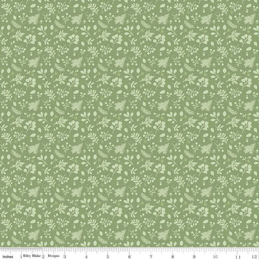 Image of the Magical Winterland Tonal Green quilting cotton fabric by Riley Blake Designs. Features tossed sprigs of leaves on a green background. 
Cute Little Fabric Shop