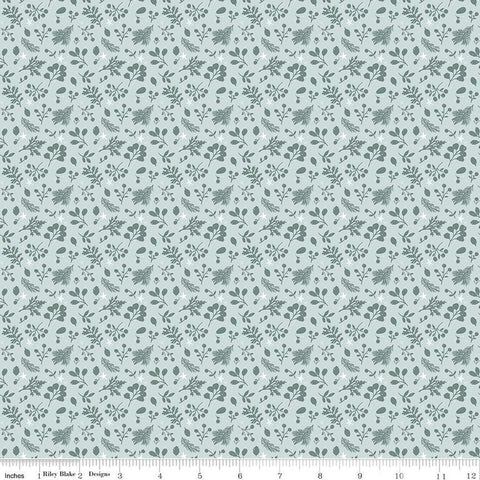 Image of the Magical Winterland Tonal Blue quilting cotton fabric by Riley Blake Designs. Features tossed sprigs of leaves on a blue background. 
Cute Little Fabric Shop