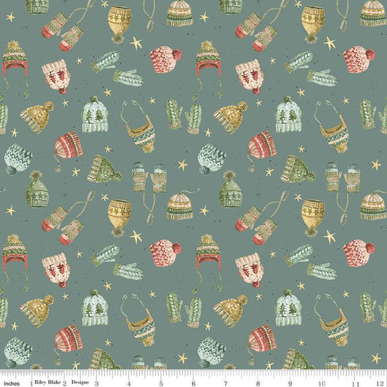 Image of the Magical Winterland Knitwear Winter quilting cotton fabric by Riley Blake Designs. Features tossed hats and mittens on a winter blue background. 
Cute Little Fabric Shop