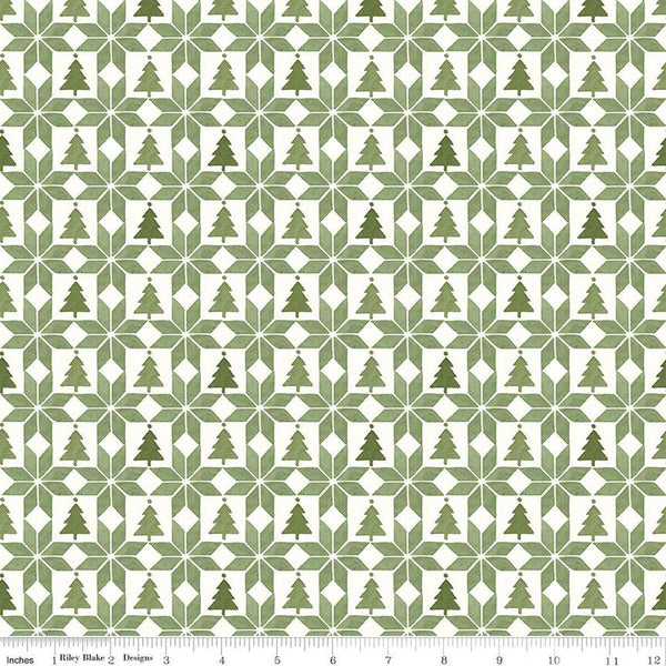 Image of the Magical Winterland Patchwork Green quilting cotton fabric by Riley Blake Designs. Features a quilt design with trees and stars on a green and white background. 
Cute Little Fabric Shop