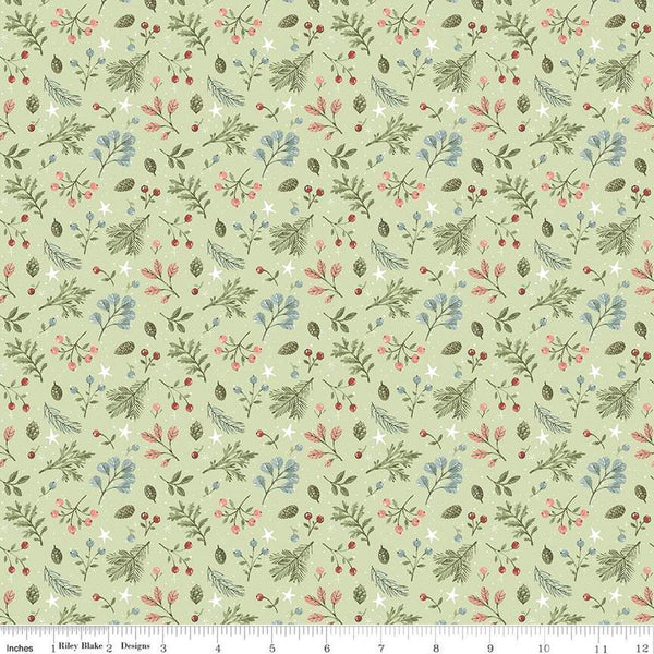 Image of the Magical Winterland Foliage Green quilting cotton fabric by Riley Blake Designs. Features a quilt design with leaves, berries, sprigs, and stars on a 
green background. 
Cute Little Fabric Shop