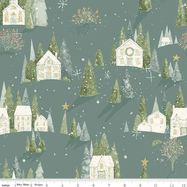 Image of the Magical Winterland Home Sweet Home Main Winter quilting cotton fabric by Riley Blake Designs. Features houses, trees, and snowflakes on a blue winter background. 
Cute Little Fabric Shop