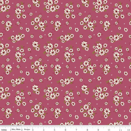 Image of the Autumn Afternoon Daisies Wine quilting cotton fabric by Heather Peterson for Riley Blake Designs. Features clusters of white flowers with green leaves on an purple background. 
Cute Little Fabric Shop