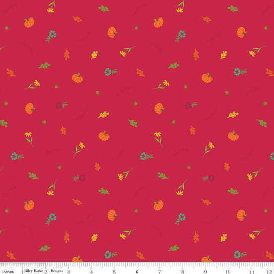 Image of the Autumn Afternoon Fall Toss Berry quilting cotton fabric by Heather Peterson for Riley Blake Designs. Features scattered flowers, pumpkins, and acorns on a dark pink red berry background. 
Cute Little Fabric Shop