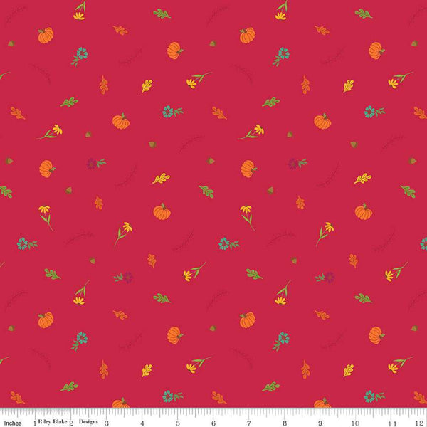 Image of the Autumn Afternoon Fall Toss Berry quilting cotton fabric by Heather Peterson for Riley Blake Designs. Features scattered flowers, pumpkins, and acorns on a dark pink red berry background. 
Cute Little Fabric Shop