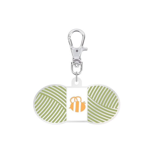 Image of the Lori Holt Enamel Happy Charm Chunky Thread Lettuce by Riley Blake Designs. Features a small enamel charm with green thread.
Cute Little Fabric Shop