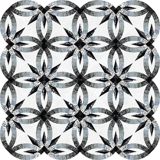 Image of the Quiltworx Achromatic Wedding Star Quilt Pattern by Riley Blake Designs. The quilt pattern has overlapping rings with stars between the overlaps. 
Cute Little Fabric Shop