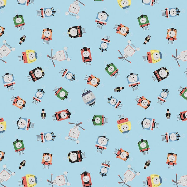 Image of the Thomas & Friends™ Sodor Railway Toss Blue quilting cotton fabric by Riley Blake Designs. Features trains and helicopters scattered on a light blue background. 
Cute Little Fabric Shop