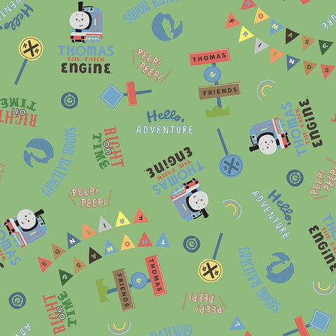 Image of the Thomas & Friends™ Sodor Railway Words Green quilting cotton fabric by Riley Blake Designs. Features scattered trains, text, and icons on a green background. 
Cute Little Fabric Shop