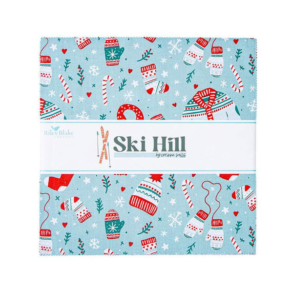 Image of the Ski Hill 10 inch Stacker by Corinne Wells for Riley Blake Designs. Features a main blue fabric with scattered coats, hats, mittens, and peppermints. 
Cute Little Fabric Shop