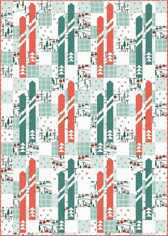 Image of the Frannie B. Quilting Co. Ski Hill Quilt Pattern by Riley Blake Designs. Features pieced skis on a patchwork background with red and green skis on a white and light blue background. 
Cute Little Fabric Shop