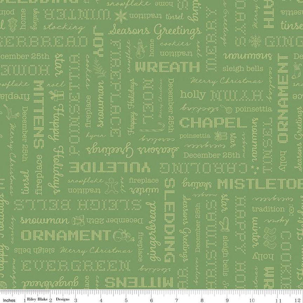 Image of the Home Town Holiday Words Basil by Riley Blake Designs. Features Christmas words and phrases on a green background. 
Cute Little Fabric Shop