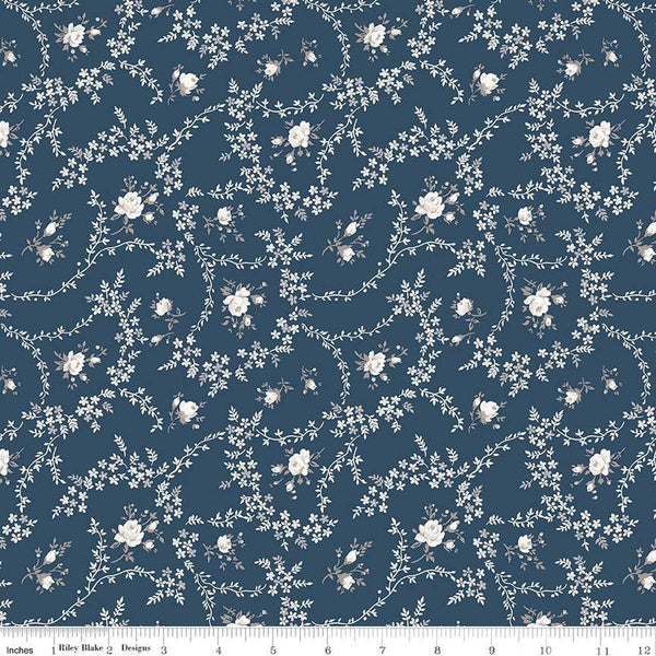 Image of the Serenity Blues Vines Navy quilting cotton fabric by Gerri Robinson for Riley Blake Designs. Features tossed blossoms and vines of leaves on a dark blue background. 
Cute Little Fabric Shop