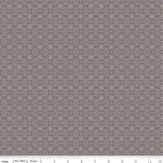 Image of the Home Town Holiday Gingerbread Milk Can by Riley Blake Designs. Features tone-on-tone array of gingerbread men and floral medallions on a dark grey brown background
Cute Little Fabric Shop