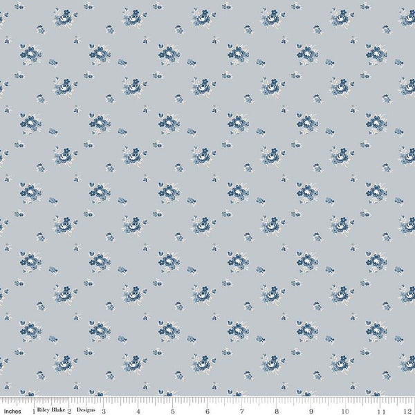 Image of the Serenity Blues Delicate Roses Gray quilting cotton fabric by Gerri Robinson for Riley Blake Designs. Features scattered flowers and small blossoms on a gray background. 
Cute Little Fabric Shop