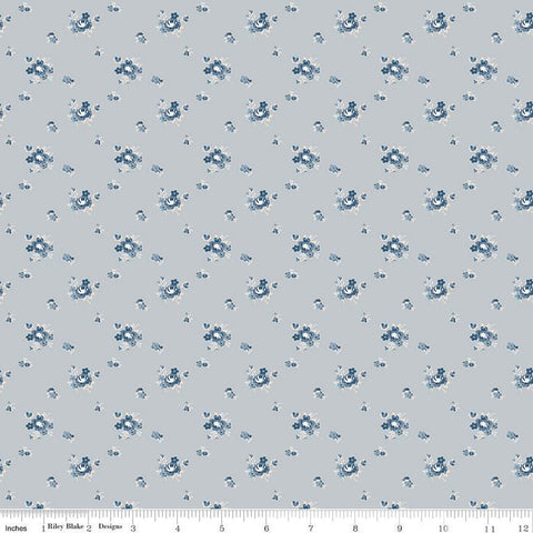 Image of the Serenity Blues Delicate Roses Gray quilting cotton fabric by Gerri Robinson for Riley Blake Designs. Features scattered flowers and small blossoms on a gray background. 
Cute Little Fabric Shop